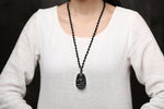 Pendentif 'Dharmachakra' en Obsidienne